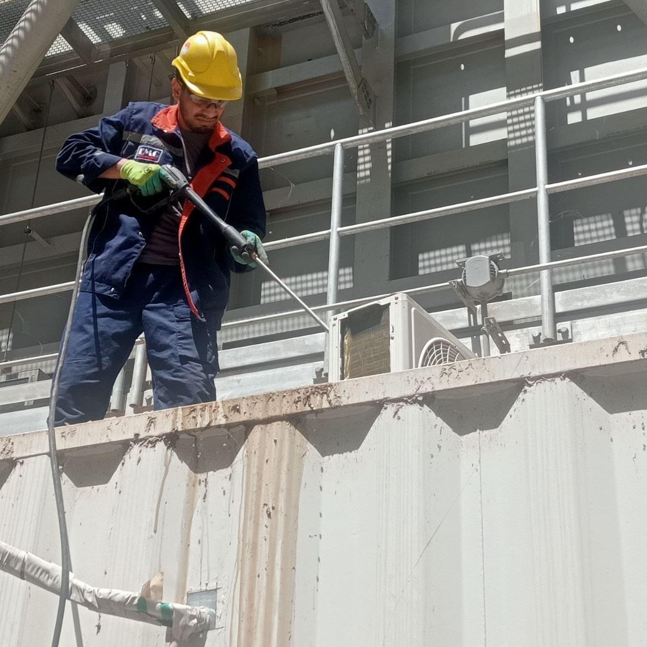 Group of engineers working together on-site managing technical project operations